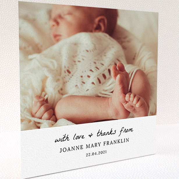A baby card design titled "Black and White Thanks". It is a square (148mm x 148mm) card in a square orientation. It is a photographic baby card with room for 1 photo. "Black and White Thanks" is available as a folded card, with mainly white colouring.