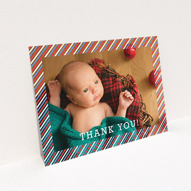 A baby card design named "Blue, Red and White Slant". It is an A5 card in a landscape orientation. It is a photographic baby card with room for 1 photo. "Blue, Red and White Slant" is available as a flat card, with mainly red colouring.