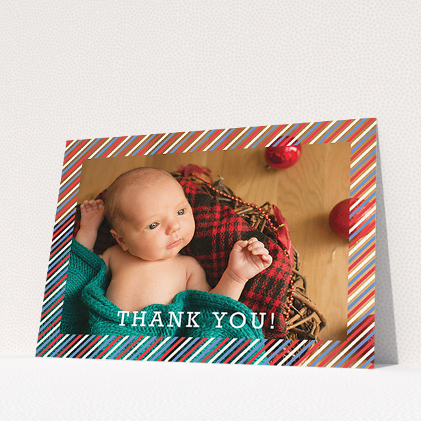 A baby card design named "Blue, Red and White Slant". It is an A5 card in a landscape orientation. It is a photographic baby card with room for 1 photo. "Blue, Red and White Slant" is available as a flat card, with mainly red colouring.
