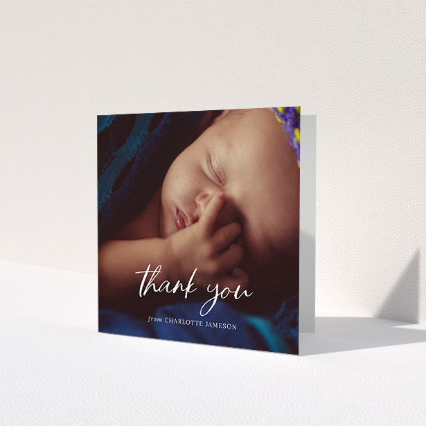 A baby card called 'Calligraphy Thanks'. It is a square (148mm x 148mm) card in a square orientation. It is a photographic baby card with room for 1 photo. 'Calligraphy Thanks' is available as a folded card, with mainly white colouring.