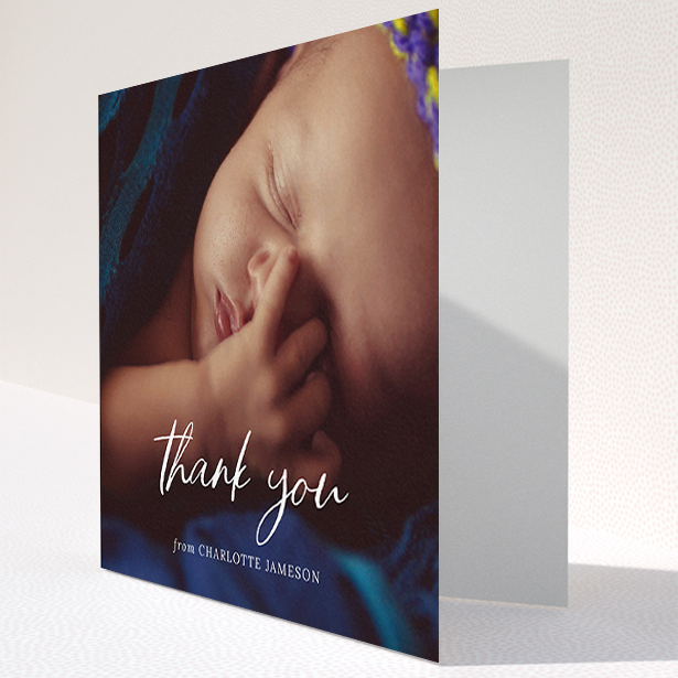 A baby card called "Calligraphy Thanks". It is a square (148mm x 148mm) card in a square orientation. It is a photographic baby card with room for 1 photo. "Calligraphy Thanks" is available as a folded card, with mainly white colouring.