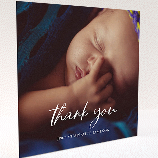 A baby card called "Calligraphy Thanks". It is a square (148mm x 148mm) card in a square orientation. It is a photographic baby card with room for 1 photo. "Calligraphy Thanks" is available as a folded card, with mainly white colouring.
