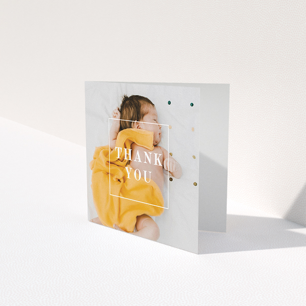 A baby card named "Central Thanks". It is a square (148mm x 148mm) card in a square orientation. It is a photographic baby card with room for 1 photo. "Central Thanks" is available as a folded card, with mainly white colouring.