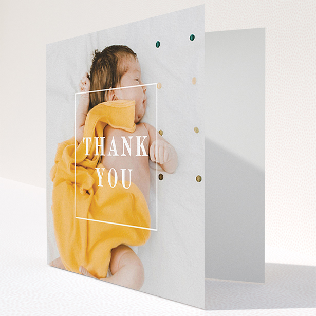A baby card named "Central Thanks". It is a square (148mm x 148mm) card in a square orientation. It is a photographic baby card with room for 1 photo. "Central Thanks" is available as a folded card, with mainly white colouring.