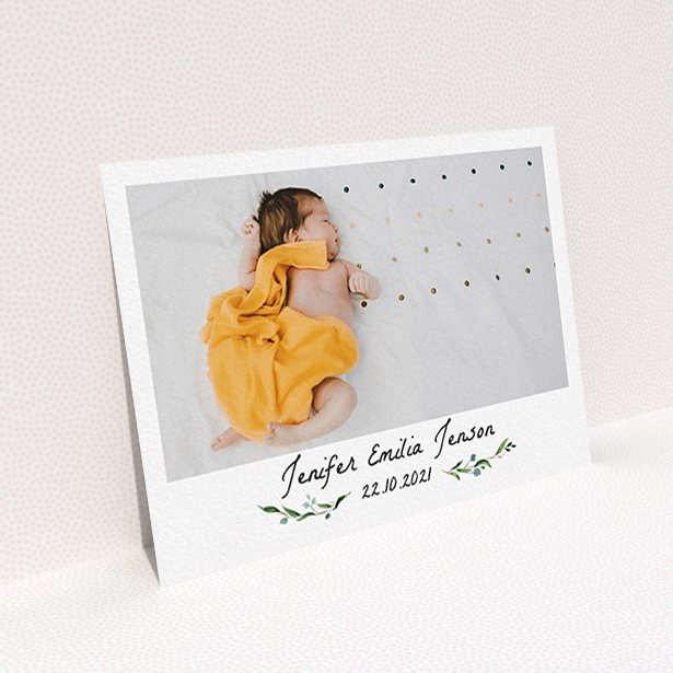 A baby card design called "Classic Floral". It is an A6 card in a landscape orientation. It is a photographic baby card with room for 1 photo. "Classic Floral" is available as a flat card, with tones of black and white.