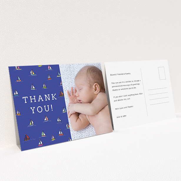 A baby card design named "Cowes Week". It is an A6 card in a landscape orientation. It is a photographic baby card with room for 1 photo. "Cowes Week" is available as a flat card, with mainly blue colouring.