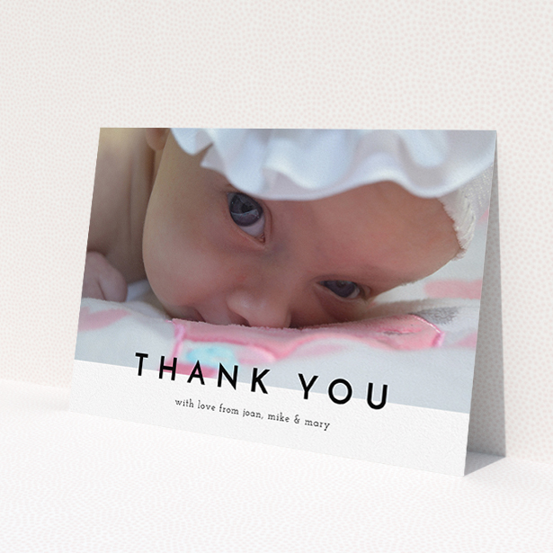 A baby card template titled 'Cross Border'. It is an A5 card in a landscape orientation. It is a photographic baby card with room for 1 photo. 'Cross Border' is available as a flat card, with mainly white colouring.