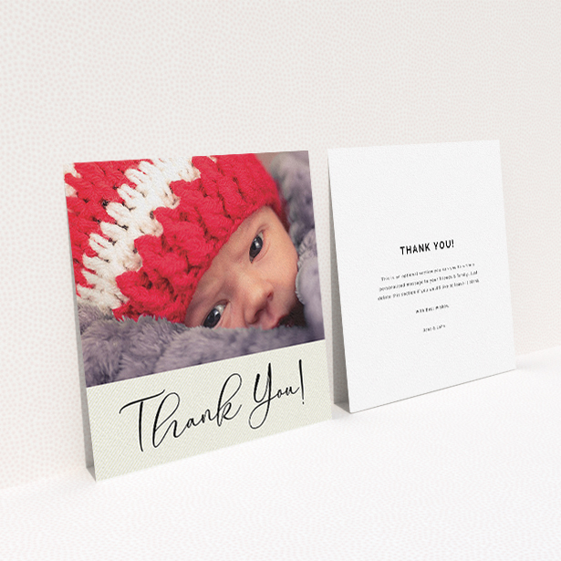 A baby card named "Cursive Thanks". It is a square (148mm x 148mm) card in a square orientation. It is a photographic baby card with room for 1 photo. "Cursive Thanks" is available as a flat card, with mainly cream colouring.