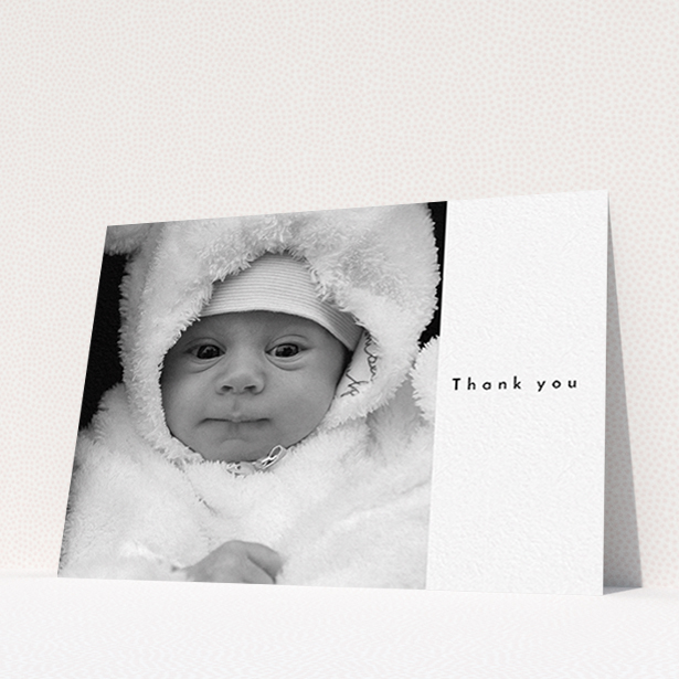 A baby card design titled "Most of the Page Frame". It is an A6 card in a landscape orientation. It is a photographic baby card with room for 1 photo. "Most of the Page Frame" is available as a flat card, with mainly white colouring.