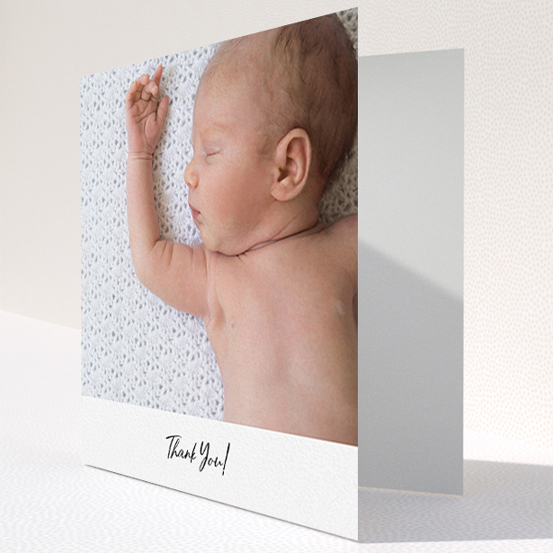 A baby card called "Mr & Mrs Footer". It is a square (148mm x 148mm) card in a square orientation. It is a photographic baby card with room for 1 photo. "Mr & Mrs Footer" is available as a folded card, with mainly white colouring.