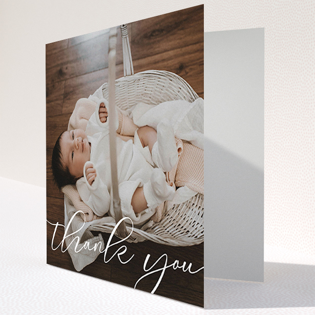 A baby card design called "One Photo". It is a square (148mm x 148mm) card in a square orientation. It is a photographic baby card with room for 1 photo. "One Photo" is available as a folded card, with mainly white colouring.