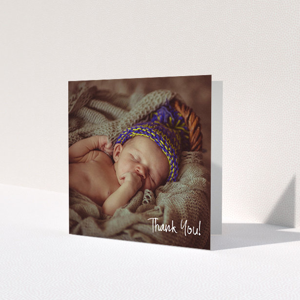 A baby card named 'Rough but Simple Photo'. It is a square (148mm x 148mm) card in a square orientation. It is a photographic baby card with room for 1 photo. 'Rough but Simple Photo' is available as a folded card, with mainly white colouring.
