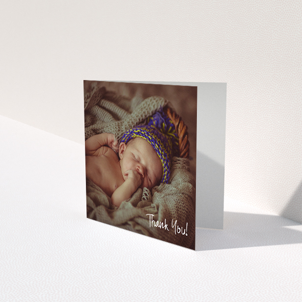 A baby card named "Rough but Simple Photo". It is a square (148mm x 148mm) card in a square orientation. It is a photographic baby card with room for 1 photo. "Rough but Simple Photo" is available as a folded card, with mainly white colouring.
