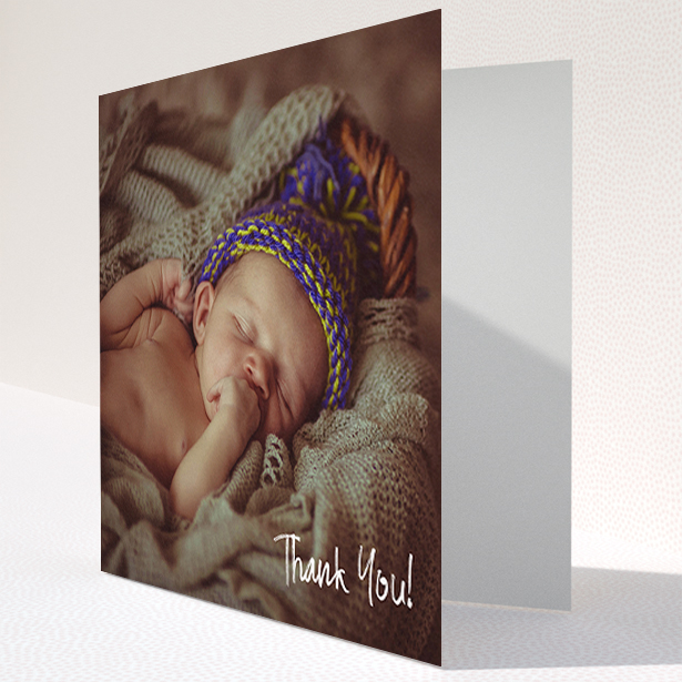 A baby card named "Rough but Simple Photo". It is a square (148mm x 148mm) card in a square orientation. It is a photographic baby card with room for 1 photo. "Rough but Simple Photo" is available as a folded card, with mainly white colouring.