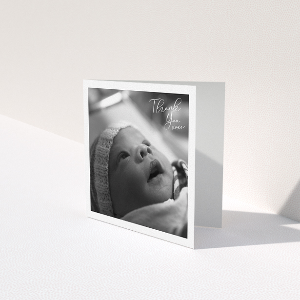 A baby card design titled "Simple Landscape Thanks". It is a square (148mm x 148mm) card in a square orientation. It is a photographic baby card with room for 1 photo. "Simple Landscape Thanks" is available as a folded card, with mainly white colouring.