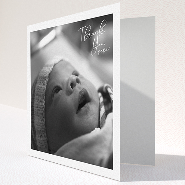A baby card design titled "Simple Landscape Thanks". It is a square (148mm x 148mm) card in a square orientation. It is a photographic baby card with room for 1 photo. "Simple Landscape Thanks" is available as a folded card, with mainly white colouring.