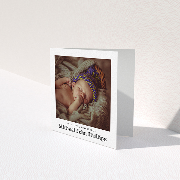 A baby card named "Simple Photo Frame". It is a square (148mm x 148mm) card in a square orientation. It is a photographic baby card with room for 1 photo. "Simple Photo Frame" is available as a folded card, with mainly white colouring.
