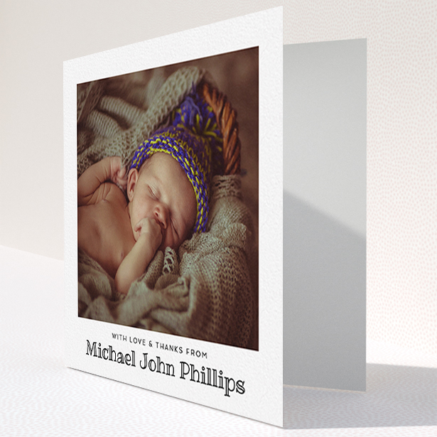 A baby card named "Simple Photo Frame". It is a square (148mm x 148mm) card in a square orientation. It is a photographic baby card with room for 1 photo. "Simple Photo Frame" is available as a folded card, with mainly white colouring.