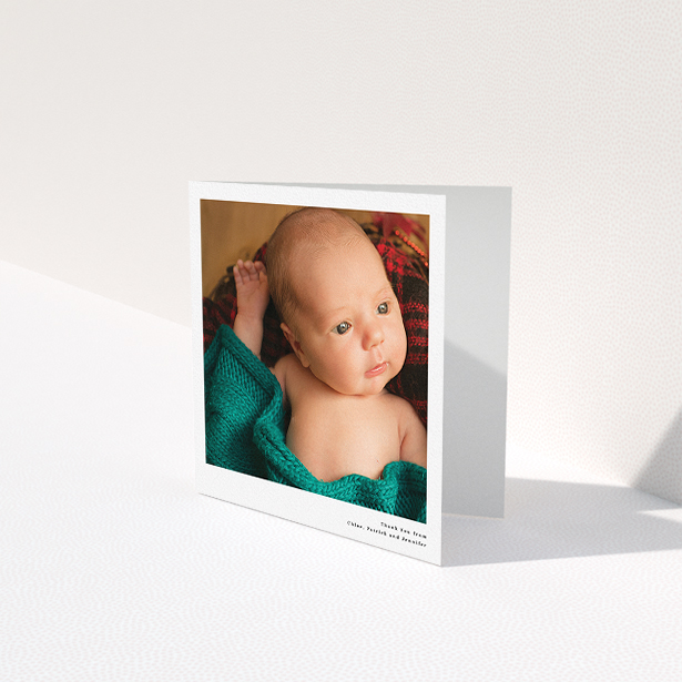 A baby card template titled "Simple Portrait". It is a square (148mm x 148mm) card in a square orientation. It is a photographic baby card with room for 1 photo. "Simple Portrait" is available as a folded card, with mainly white colouring.