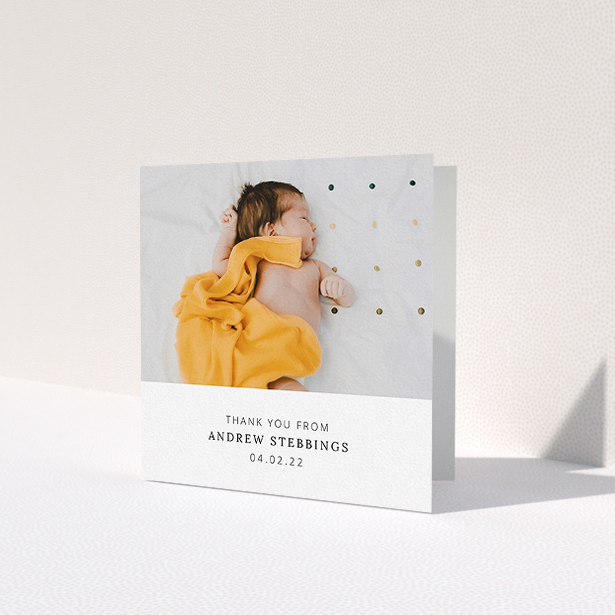 A baby card design named 'Simple, Portrait Thank You'. It is a square (148mm x 148mm) card in a square orientation. It is a photographic baby card with room for 1 photo. 'Simple, Portrait Thank You' is available as a folded card, with mainly white colouring.