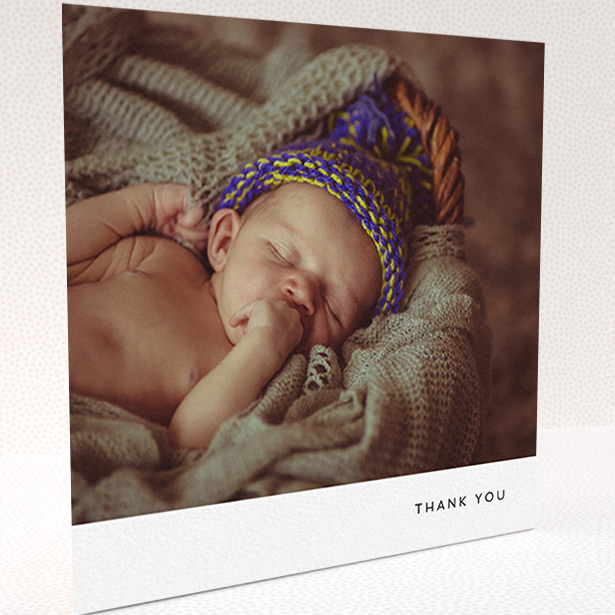 A baby card design titled "Thankful with Simplicity". It is a square (148mm x 148mm) card in a square orientation. It is a photographic baby card with room for 1 photo. "Thankful with Simplicity" is available as a folded card, with mainly white colouring.
