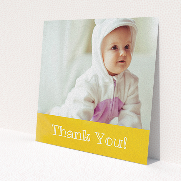 A baby card named 'Thanks In Yellow'. It is a square (148mm x 148mm) card in a square orientation. It is a photographic baby card with room for 1 photo. 'Thanks In Yellow' is available as a flat card, with tones of yellow and white.