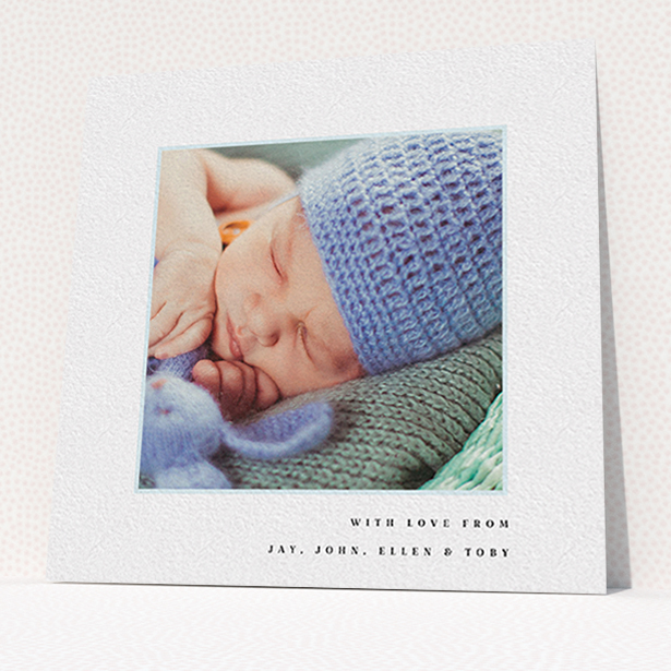 A baby card called "Thin Blue Frame". It is a square (148mm x 148mm) card in a square orientation. It is a photographic baby card with room for 1 photo. "Thin Blue Frame" is available as a flat card, with tones of white and blue.