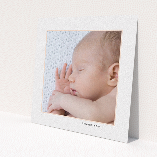A baby card named 'Thin Pink Frame'. It is a square (148mm x 148mm) card in a square orientation. It is a photographic baby card with room for 1 photo. 'Thin Pink Frame' is available as a flat card, with tones of white and pink.