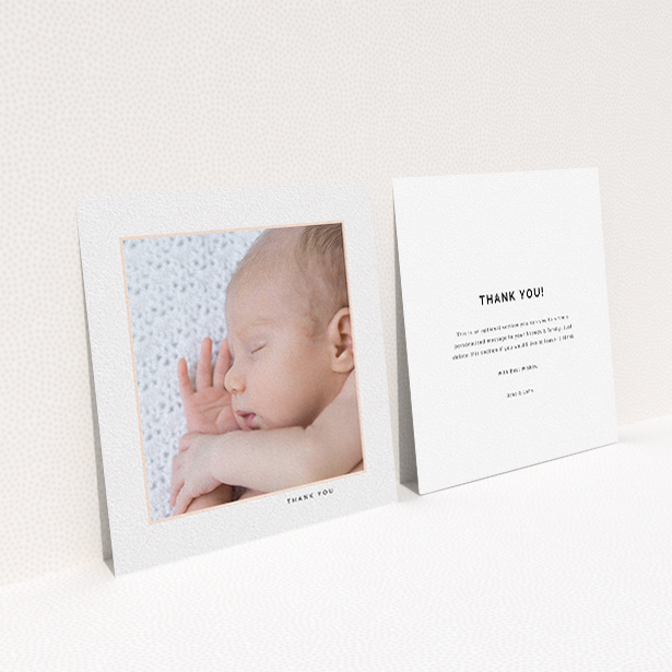 A baby card named "Thin Pink Frame". It is a square (148mm x 148mm) card in a square orientation. It is a photographic baby card with room for 1 photo. "Thin Pink Frame" is available as a flat card, with tones of white and pink.