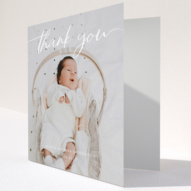 A baby card called "Topped and Bottomed". It is a square (148mm x 148mm) card in a square orientation. It is a photographic baby card with room for 1 photo. "Topped and Bottomed" is available as a folded card, with mainly white colouring.