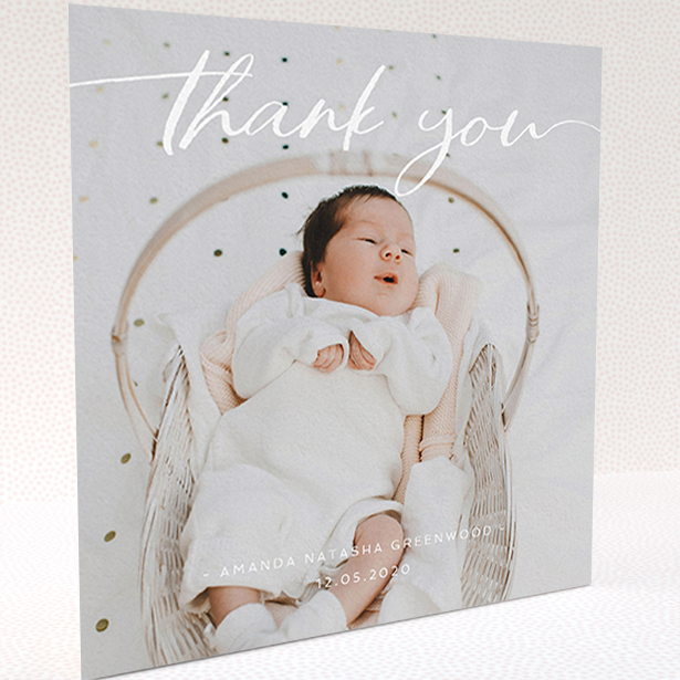 A baby card called "Topped and Bottomed". It is a square (148mm x 148mm) card in a square orientation. It is a photographic baby card with room for 1 photo. "Topped and Bottomed" is available as a folded card, with mainly white colouring.