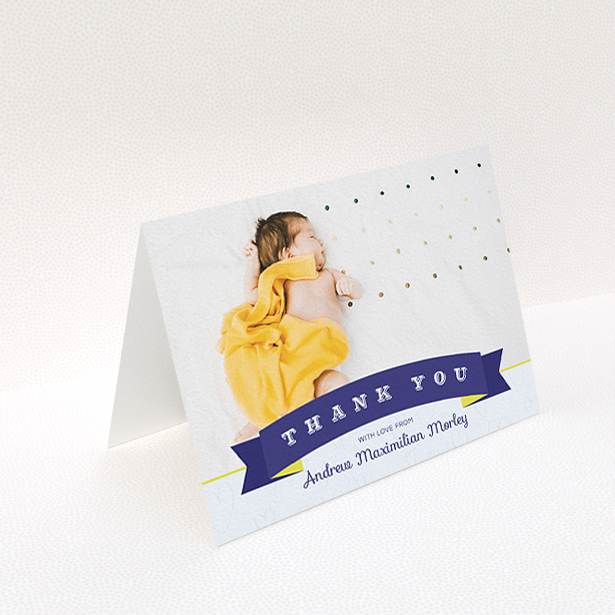 A baby thank you card design called "Big Banner". It is an A6 card in a landscape orientation. It is a photographic baby thank you card with room for 1 photo. "Big Banner" is available as a folded card, with tones of navy blue and white.