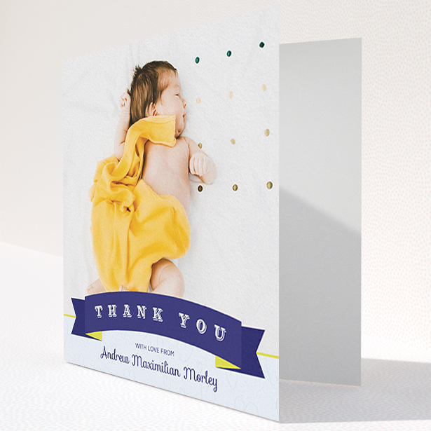 A baby thank you card design titled "Big Banner". It is a square (148mm x 148mm) card in a square orientation. It is a photographic baby thank you card with room for 1 photo. "Big Banner" is available as a folded card, with tones of navy blue and white.