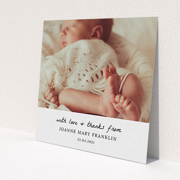 A baby thank you card design named 'Black and White Thanks'. It is a square (148mm x 148mm) card in a square orientation. It is a photographic baby thank you card with room for 1 photo. 'Black and White Thanks' is available as a flat card, with mainly white colouring.