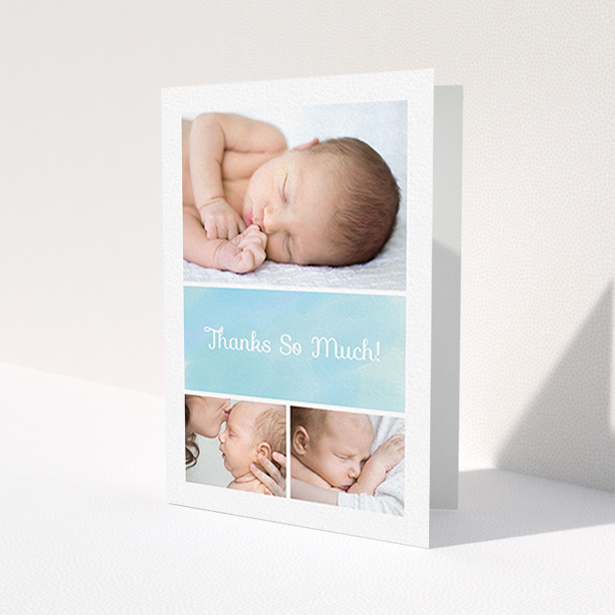 A baby thank you card template titled 'Block Tower'. It is an A6 card in a portrait orientation. It is a photographic baby thank you card with room for 3 photos. 'Block Tower' is available as a folded card, with tones of blue and white.