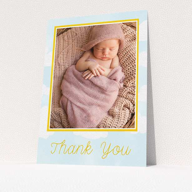A baby thank you card called "Blue Skies". It is an A5 card in a portrait orientation. It is a photographic baby thank you card with room for 1 photo. "Blue Skies" is available as a flat card, with tones of blue and yellow.