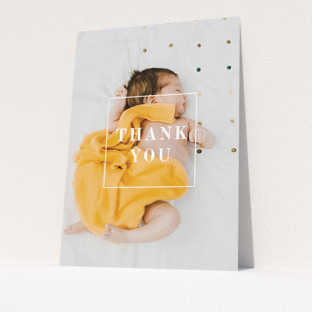 A baby thank you card design called "Central Thanks". It is an A6 card in a portrait orientation. It is a photographic baby thank you card with room for 1 photo. "Central Thanks" is available as a flat card, with mainly white colouring.