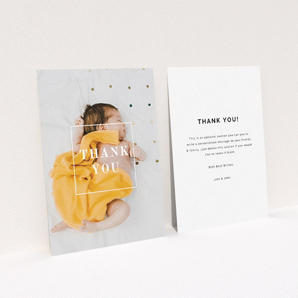 A baby thank you card design called "Central Thanks". It is an A6 card in a portrait orientation. It is a photographic baby thank you card with room for 1 photo. "Central Thanks" is available as a flat card, with mainly white colouring.
