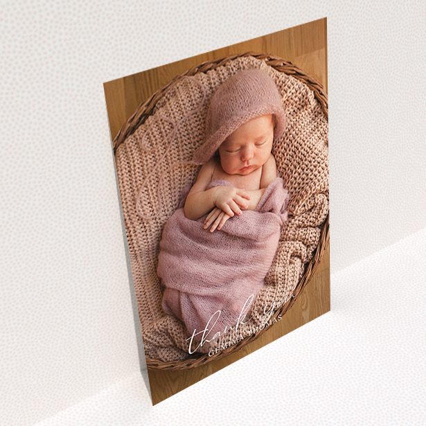A baby thank you card design named "Classic Thank You". It is an A6 card in a portrait orientation. It is a photographic baby thank you card with room for 1 photo. "Classic Thank You" is available as a flat card, with mainly white colouring.