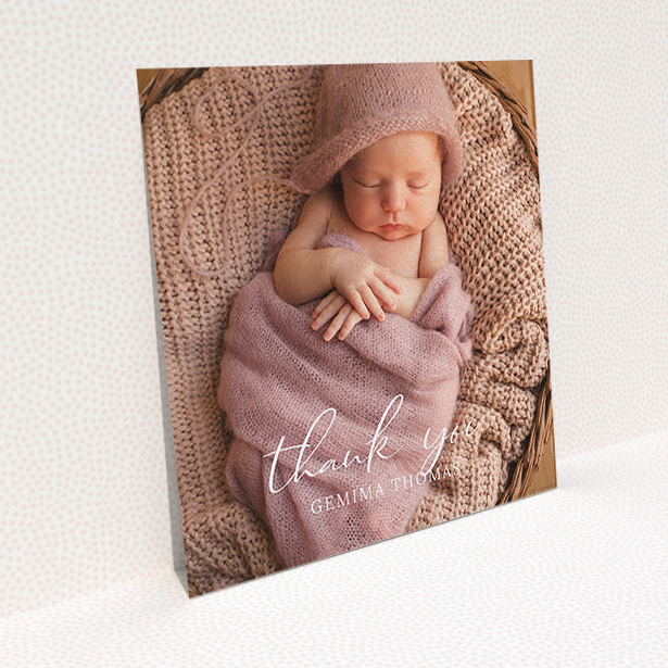 A baby thank you card named "Classic Thank You". It is a square (148mm x 148mm) card in a square orientation. It is a photographic baby thank you card with room for 1 photo. "Classic Thank You" is available as a flat card, with mainly white colouring.