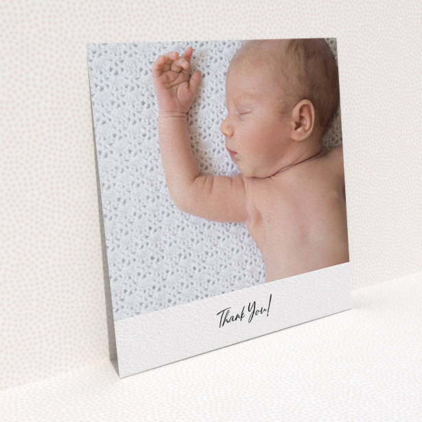 A baby thank you card design titled "Mr & Mrs Footer". It is a square (148mm x 148mm) card in a square orientation. It is a photographic baby thank you card with room for 1 photo. "Mr & Mrs Footer" is available as a flat card, with mainly white colouring.