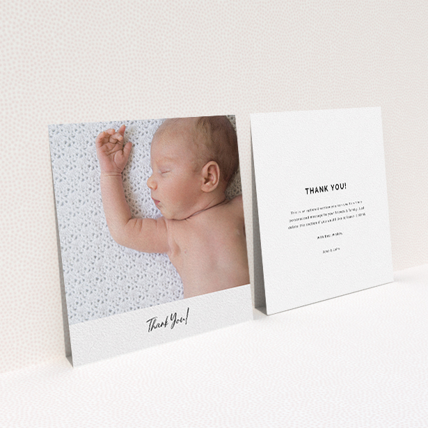 A baby thank you card design titled "Mr & Mrs Footer". It is a square (148mm x 148mm) card in a square orientation. It is a photographic baby thank you card with room for 1 photo. "Mr & Mrs Footer" is available as a flat card, with mainly white colouring.