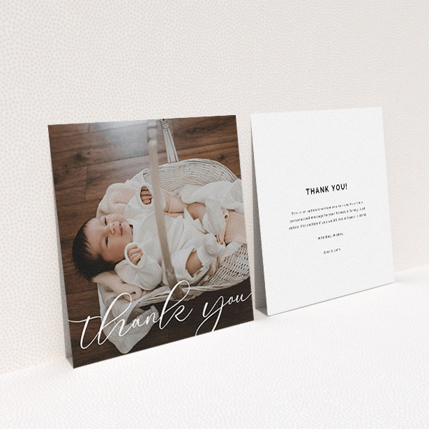 A baby thank you card template titled "One Photo". It is a square (148mm x 148mm) card in a square orientation. It is a photographic baby thank you card with room for 1 photo. "One Photo" is available as a flat card, with mainly white colouring.