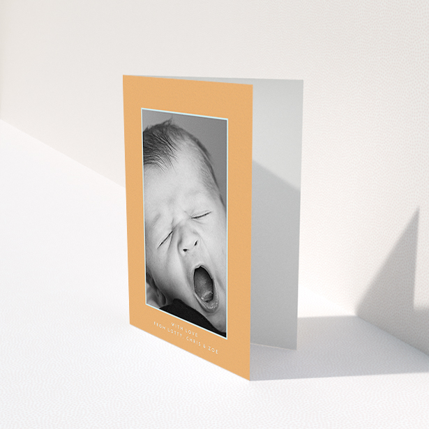 A baby thank you card design named "Orange and Mint". It is an A6 card in a portrait orientation. It is a photographic baby thank you card with room for 1 photo. "Orange and Mint" is available as a folded card, with tones of orange and blue.