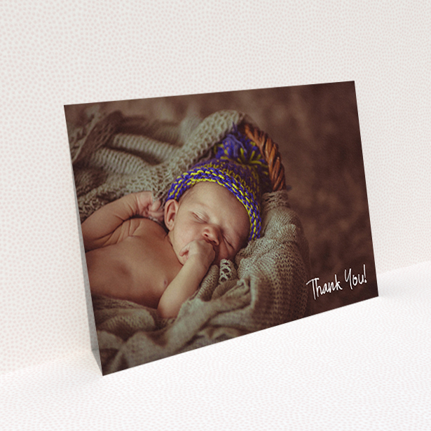 A baby thank you card named "Rough but Simple Photo". It is an A6 card in a landscape orientation. It is a photographic baby thank you card with room for 1 photo. "Rough but Simple Photo" is available as a flat card, with mainly white colouring.