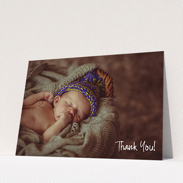 A baby thank you card named "Rough but Simple Photo". It is an A6 card in a landscape orientation. It is a photographic baby thank you card with room for 1 photo. "Rough but Simple Photo" is available as a flat card, with mainly white colouring.