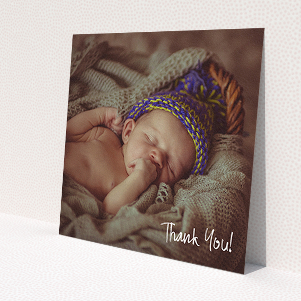 A baby thank you card design called 'Rough but Simple Photo'. It is a square (148mm x 148mm) card in a square orientation. It is a photographic baby thank you card with room for 1 photo. 'Rough but Simple Photo' is available as a flat card, with mainly white colouring.