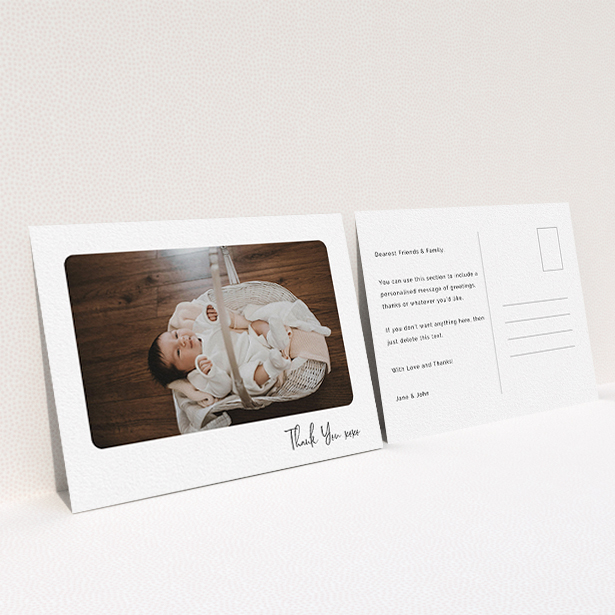 A baby thank you card design named "Rounded Thanks". It is an A6 card in a landscape orientation. It is a photographic baby thank you card with room for 1 photo. "Rounded Thanks" is available as a flat card, with mainly white colouring.