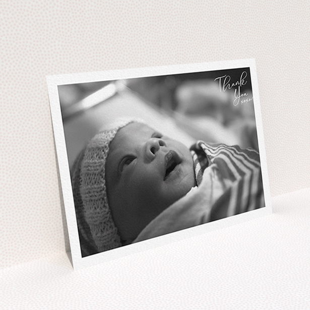 A baby thank you card named "Simple Landscape Thanks". It is an A6 card in a landscape orientation. It is a photographic baby thank you card with room for 1 photo. "Simple Landscape Thanks" is available as a flat card, with mainly white colouring.