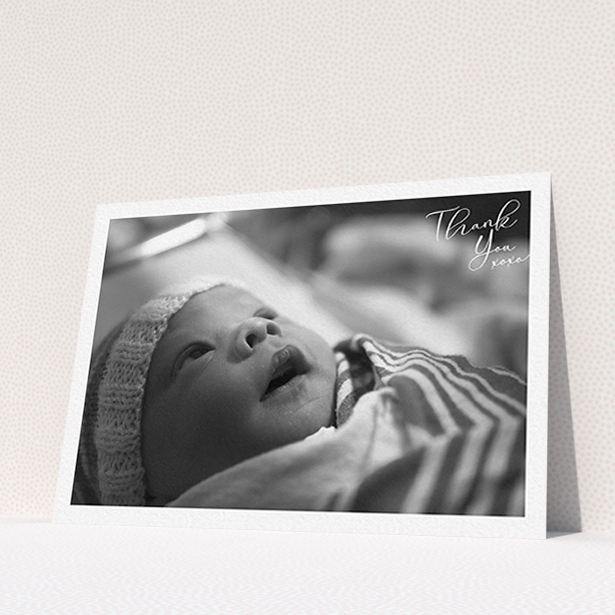 A baby thank you card named "Simple Landscape Thanks". It is an A6 card in a landscape orientation. It is a photographic baby thank you card with room for 1 photo. "Simple Landscape Thanks" is available as a flat card, with mainly white colouring.